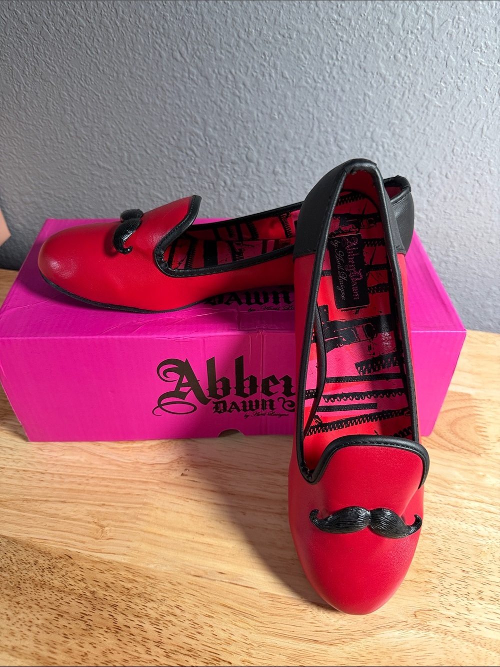 Abbey Dawn Red Flats with Black Trim and Mustache Accent